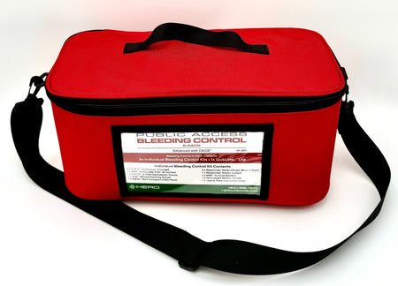 Front view of HERO Public Access Bleed Kit with shoulder strap and labeled emergency contents, designed for quick bleeding control in crises.