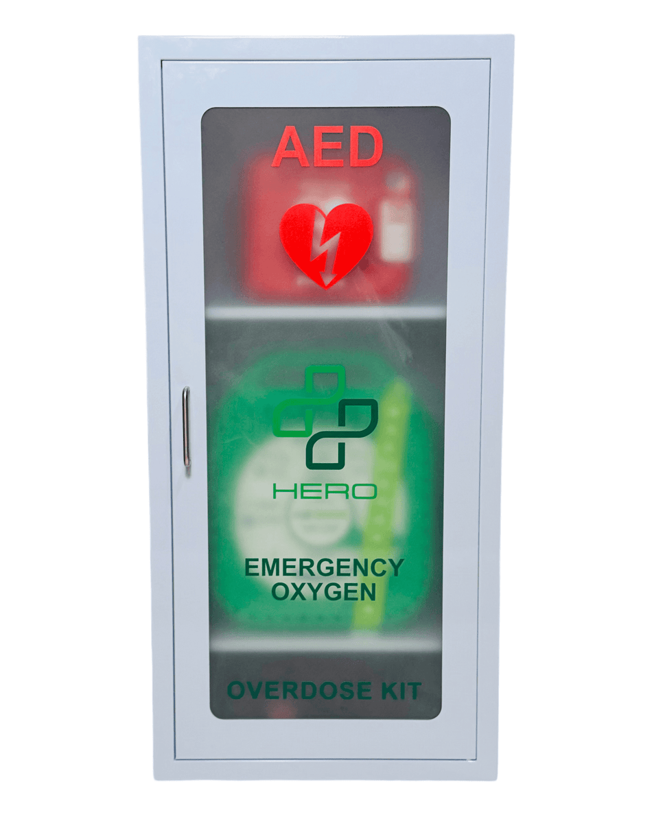 HERO3 Emergency Station smart cabinet with AED, oxygen, and Narcan kit labels on a wall-mounted unit for emergency preparedness in public areas.