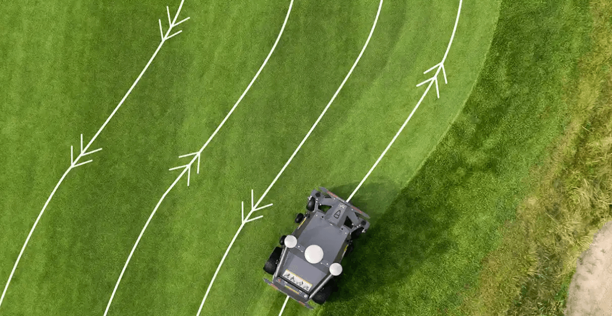 Autonomous turf mower on field
