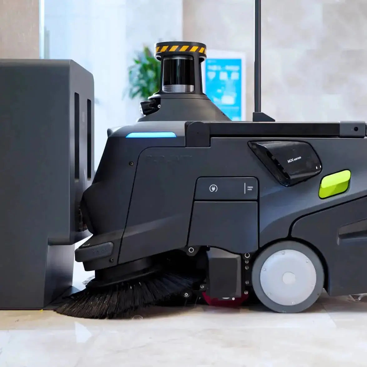 Close-up of autonomous cleaning robot with dust collection system